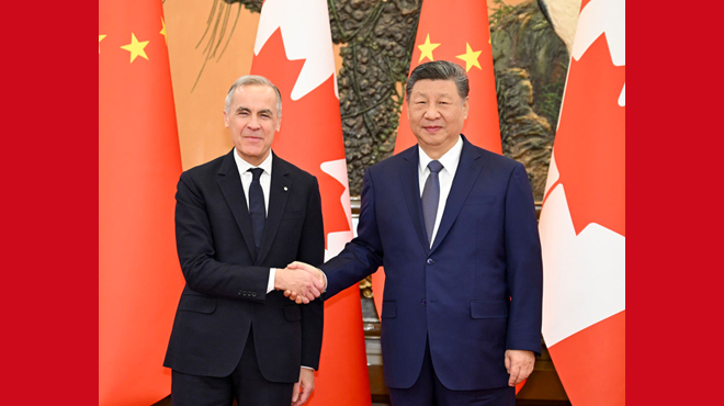 习近平会见加拿大总理卡尼